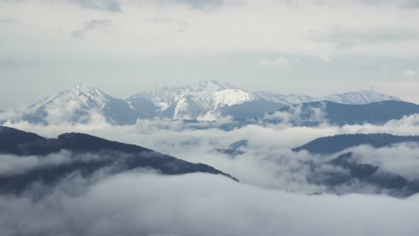 Time Lapse Fog Rolling Over Mountain Valley