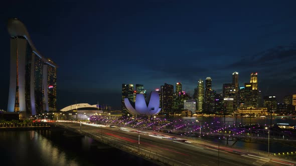 4K Time lapse zoom out of Singapore skyline