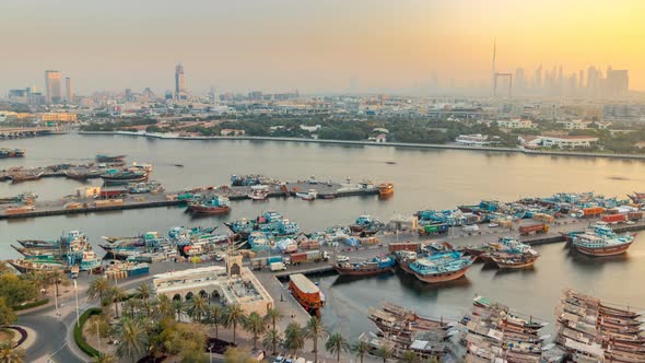 Dubai Creek Landscape Timelapse with Boats and Ship in Port and Modern Buildings in the Background
