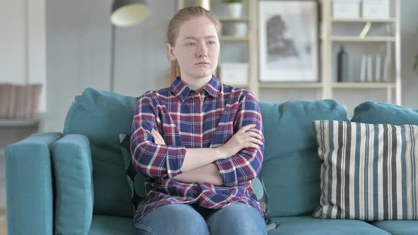 Young Woman Standing Up And Leaving