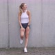 Optimistic Female Athlete Taking Break Near Wall - VideoHive Item for Sale