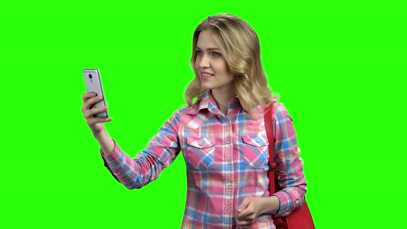 Sociable Woman Using Smartphone on Green Screen