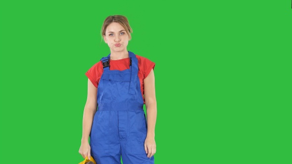 Woman worker very tired on a Green Screen, Chroma Key.