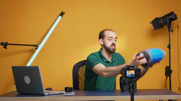 Vlogger Holding Video Light