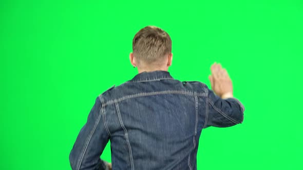 Back View of Man Goes Then Starts To Run, Waves His Hand Stand, Chroma Key