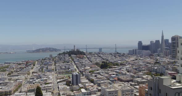 Rising Aerial Pan of San Francisco Neighborhood and Skyline