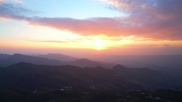 4K Aerial view over the mountains at sunset. Drone Flight Footage