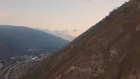 Aerial Motion Along Steep Slope Tyrnyauz City Road To Elbrus in Baksan Valley
