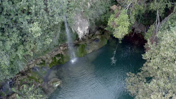 Drone Video of the Ruins of a Waterfall in the Forest a Romantic Place