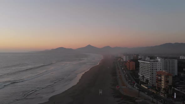 Orange Sunset Pacific Ocean (La Serena, Chile) aerial view, drone footage