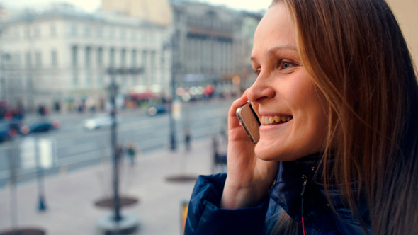 Emotional Woman Having A Phone Talk Outdoor