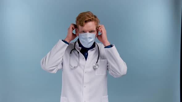 Physician or Doctor Putting a Face Mask on Blue Background