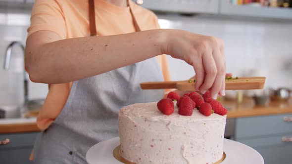 Woman Cooking Food and Baking on Kitchen at Home