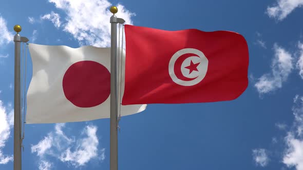 Japan Flag Vs Tunisia Flag On Flagpole