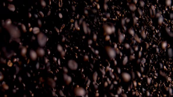 Downfall Heap Coffee Grains on Dark Background