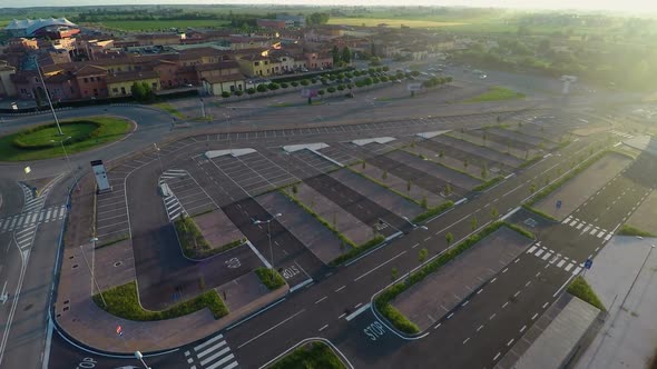 Drone Flying Over Parking, Checking Free Places at Outlet Village Mantova, Italy