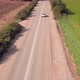 Beautiful day at rural side of the Country, Highway with car passing by blue sky in the Background - VideoHive Item for Sale
