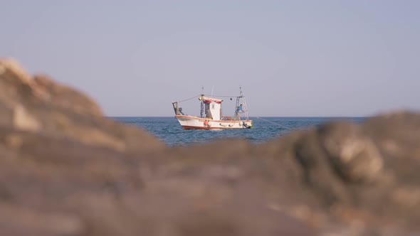 Small fishing boat near the shoreline