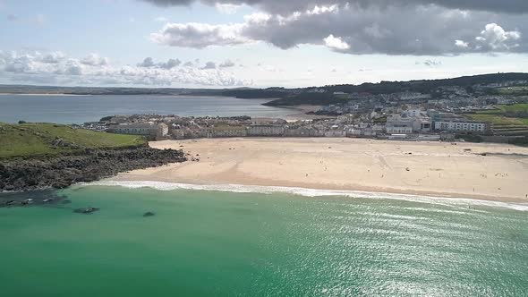 Aerial fly in establishing shot of St Ives Cornwall England UK