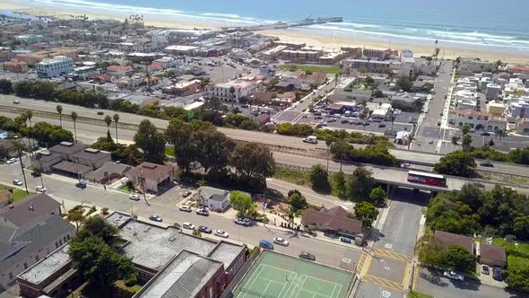Highway 101 on the coast In the background wooden pier Fantastic aerial view flight panorama overvi