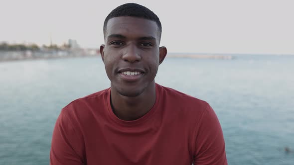 Portrait Happy Black American Man Looking at Camera By the Sea