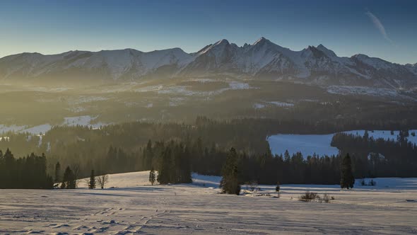 Timelapse of sunrise in Tatra mountains at winter in Poland