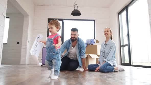 The Young Family Is in Their New Summer House, Where They Are Making Plans To Renovate the House