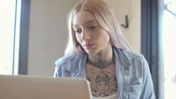 Woman using laptop computer