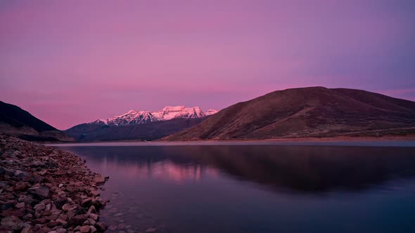 Colorful sunrise timelapse on Deer Creek Reservoir looking at Timpanogos