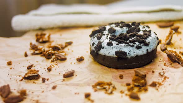 Chocolate Donuts Decorated with Pieces of Oreo Biscuits