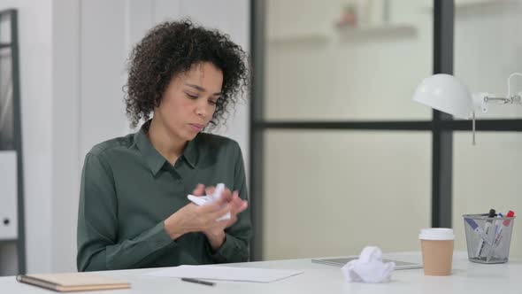 African Woman Unable To Write Work Torning Paper