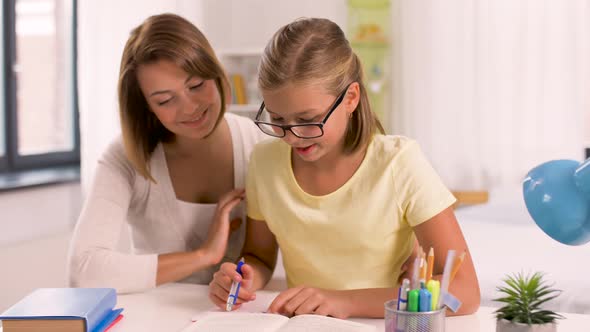 Mother and Daughter Doing Homework Together 5