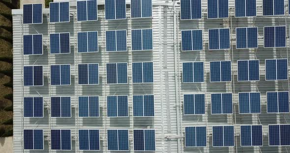 Bird's Eye View Over Rooftop Solar Installation At Eco Business Park