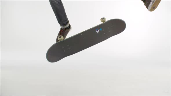 Skater rolling into kickflip trick,  Slow Motion alt