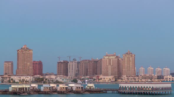 View From Katara Beach Day To Night Timelapse in Doha Qatar Towards the Pearl