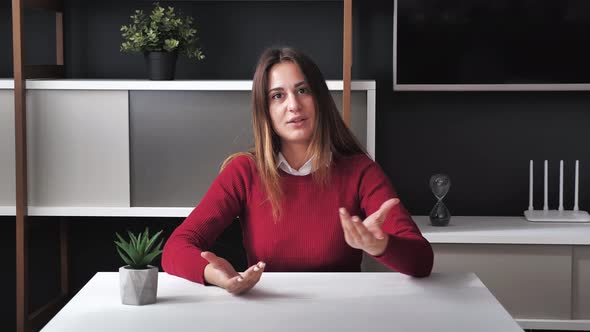 A POV Video of a Woman Hanging Out Online on a Video Chat at Home Modern Office Background