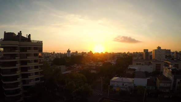 Beautiful Sunset Over City. Zoom in on Downtown