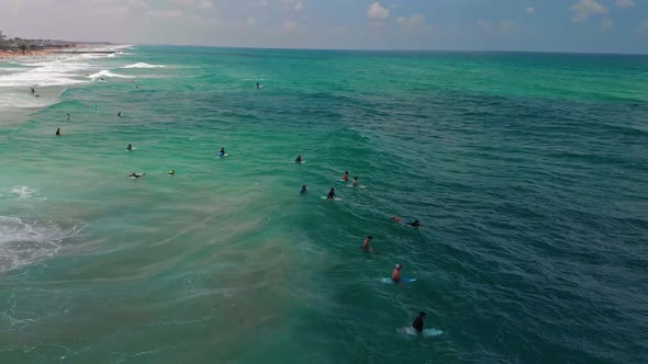 Surfers Surfing in Haifa Israel