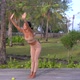 Spiritual Yoga Practice on the Path Surrounded By Tropical Nature Woman Doing Salute to the Sun - VideoHive Item for Sale