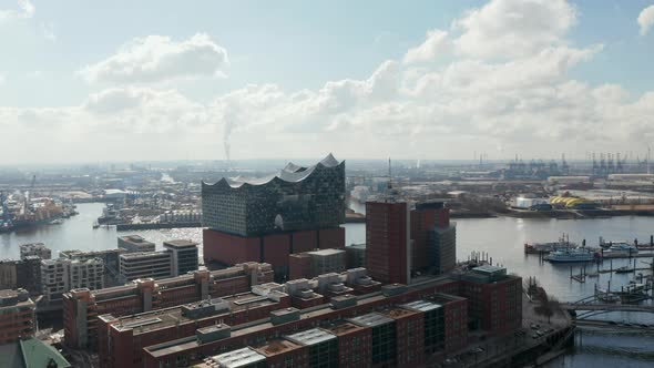Aerial Dolly View of Modern Elbphilharmonie Concert Hall Building By Elbe River in Hamburg