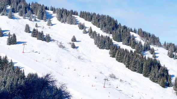 Ski Lift on Alpine Resort Over the Mountain Ridge