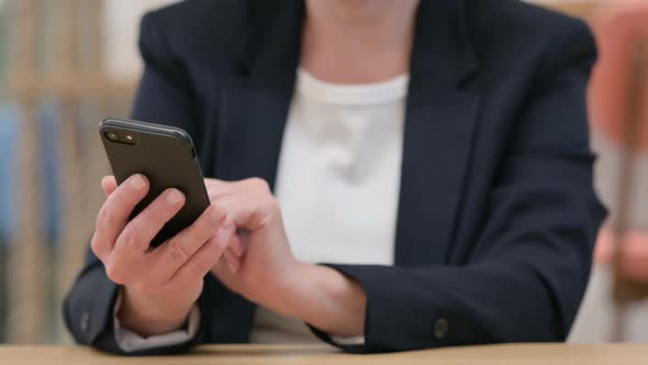 Close Up of Businesswoman Using Smartphone