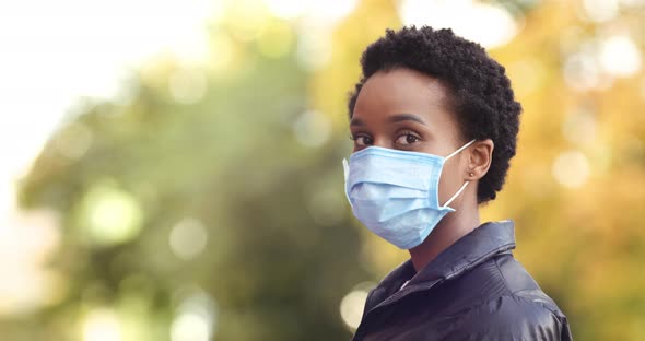 Female Patient Black Woman Ill Auro American Girl Standing Outdoors in Profile Looking at Camera