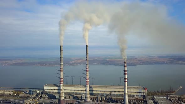 Aerial View of High Chimney Pipes with Grey Smoke From Coal Power Plant