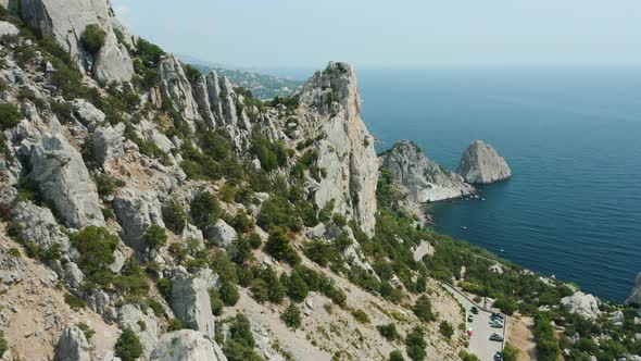 Aerial Fly Above Mountain Koshka of Simeiz with Diva Rock in Background