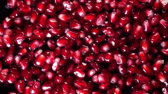 Rotation of Pomegranate Seeds Close Up 