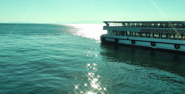 Sunlight Reflection On The Sea Water And Ferryboat alt