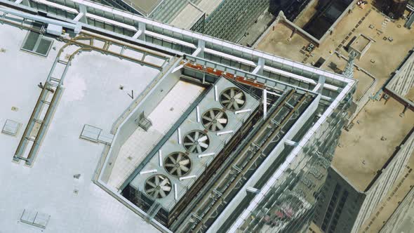 Fans of Air Conditioning System Spinning on Roof Top of Skyscraper New York