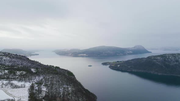 Ferry Boat Crossing Scenic Fjord Landscape In Norway, Aerial
