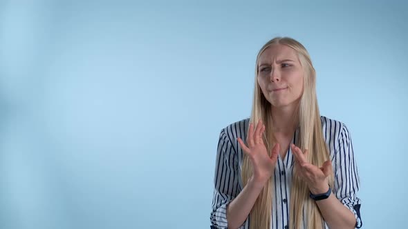 Attractive Young Woman Counting Something on Fingers